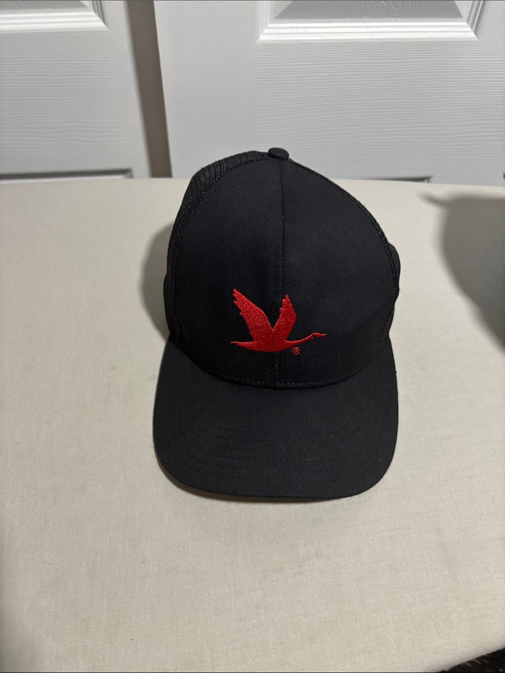 Black Trucker Cap with Red Bird Embroidery